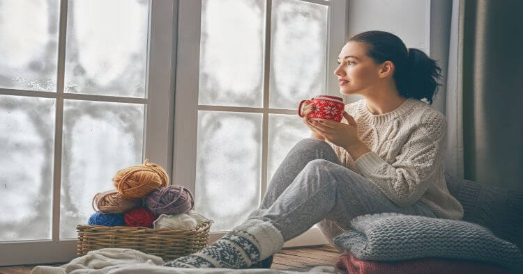 Woman Looking Out window